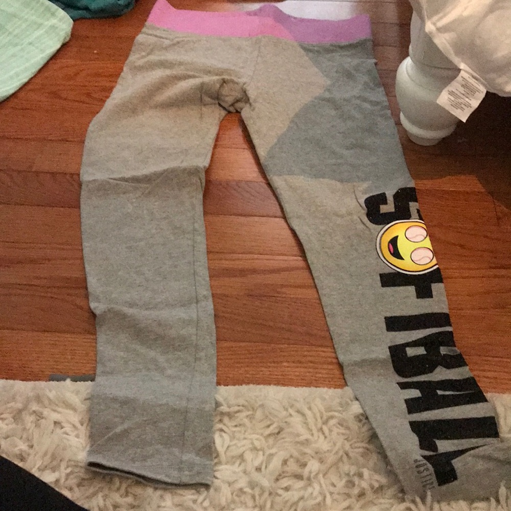 Justice leggings with glitter spelling softball